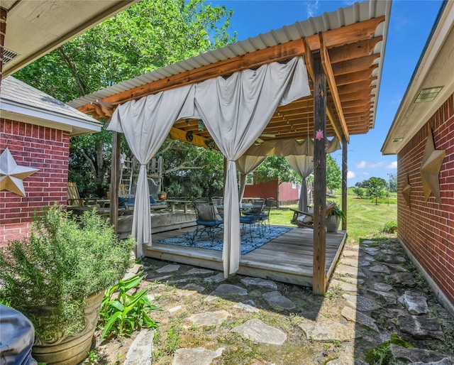 121 Sanchez Creek Ct, Weatherford, TX 76088 - view of patio featuring a gazebo, a wooden deck, and outdoor dining space