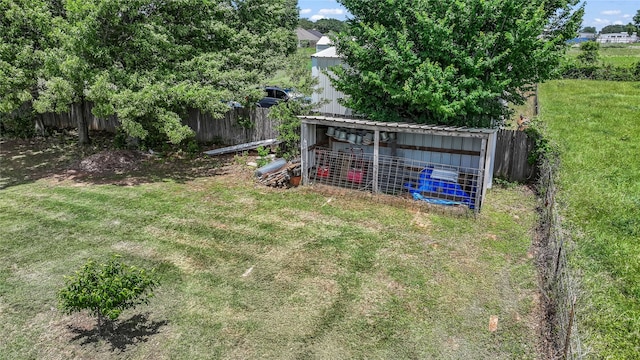 121 Sanchez Creek Ct, Weatherford, TX 76088 - view of yard with an outbuilding