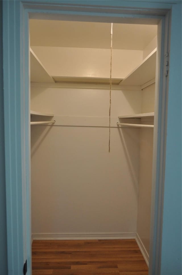 722 Sunset St, Sulphur Springs, TX 75482 - spacious closet with wood finished floors