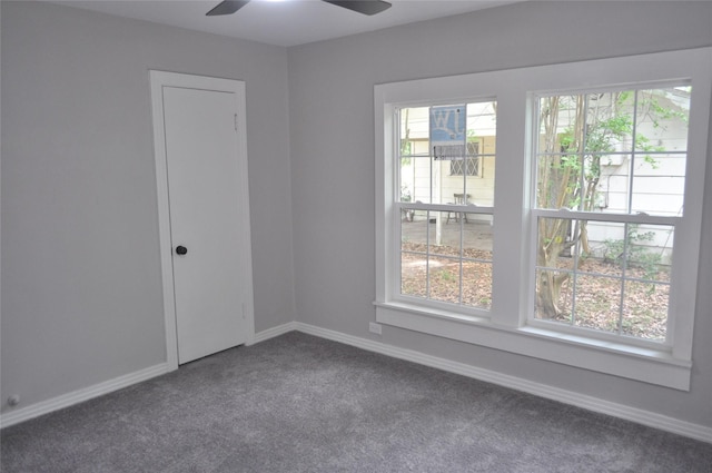 722 Sunset St, Sulphur Springs, TX 75482 - empty room featuring dark colored carpet, ceiling fan, and baseboards