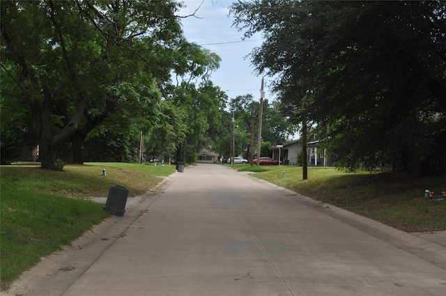 722 Sunset St, Sulphur Springs, TX 75482 - view of concrete street featuring curbs