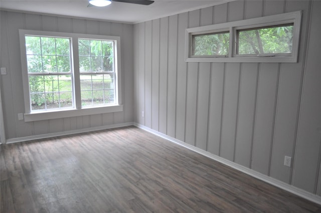 722 Sunset St, Sulphur Springs, TX 75482 - unfurnished room with wood finished floors, healthy amount of natural light, and baseboards