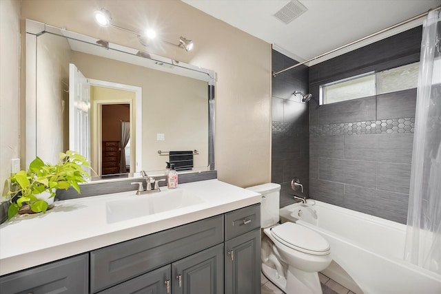 8405 Circleview St, Rowlett, TX 75088 - full bathroom featuring shower / bath combination, vanity, toilet, and tile patterned flooring