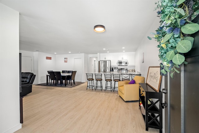 304 Thomas St, Terrell, TX 75160 - dining space featuring light wood finished floors and recessed lighting