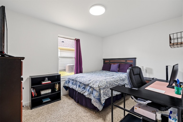 304 Thomas St, Terrell, TX 75160 - bedroom featuring light colored carpet and an office area