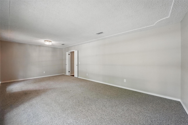 2009 Botts Dr, Arlington, TX 76012 - carpeted empty room with a textured ceiling and baseboards