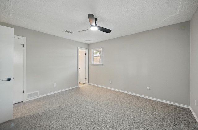 2009 Botts Dr, Arlington, TX 76012 - carpeted spare room featuring ceiling fan, a textured ceiling, and baseboards