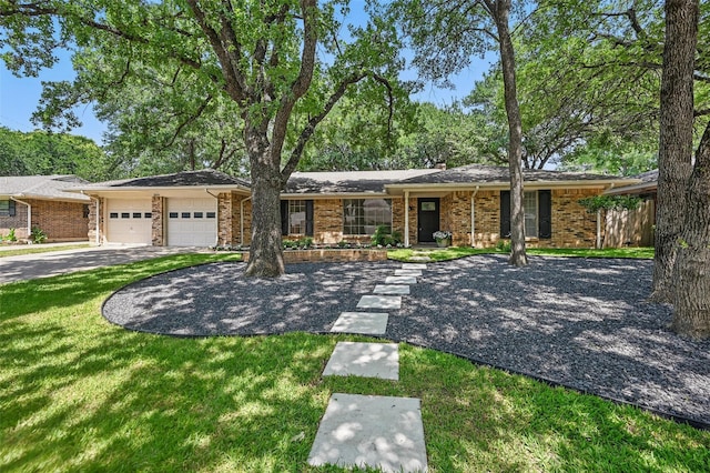 2009 Botts Dr, Arlington, TX 76012 - ranch-style house featuring a garage, driveway, brick siding, and a front lawn