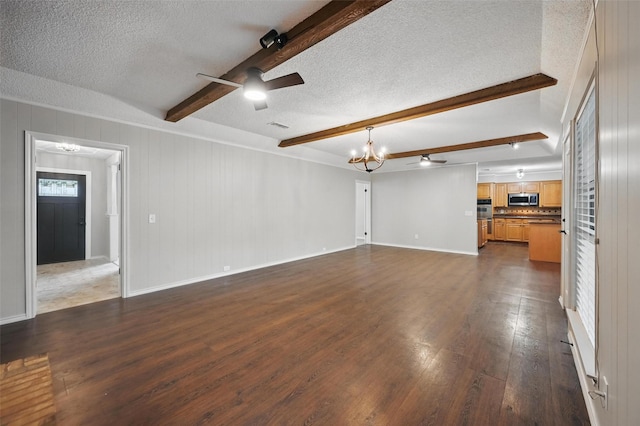 2009 Botts Dr, Arlington, TX 76012 - unfurnished living room featuring ceiling fan, beam ceiling, a chandelier, dark wood-style floors, and a textured ceiling
