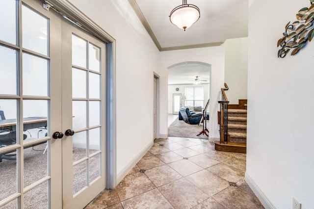 1420 Candler Dr, Prosper, TX 75078 - corridor with crown molding, stairway, baseboards, and arched walkways