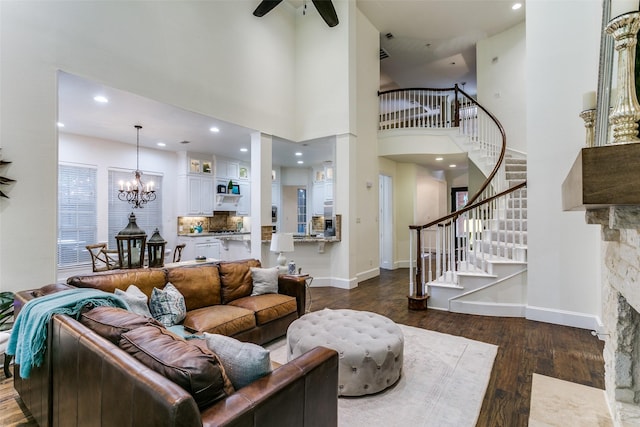 2219 Graystone Ct, Keller, TX 76248 - living room with dark wood-type flooring, stairway, ceiling fan, baseboards, and recessed lighting