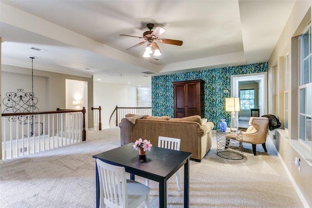 2219 Graystone Ct, Keller, TX 76248 - carpeted living area featuring a ceiling fan, plenty of natural light, wallpapered walls, and baseboards