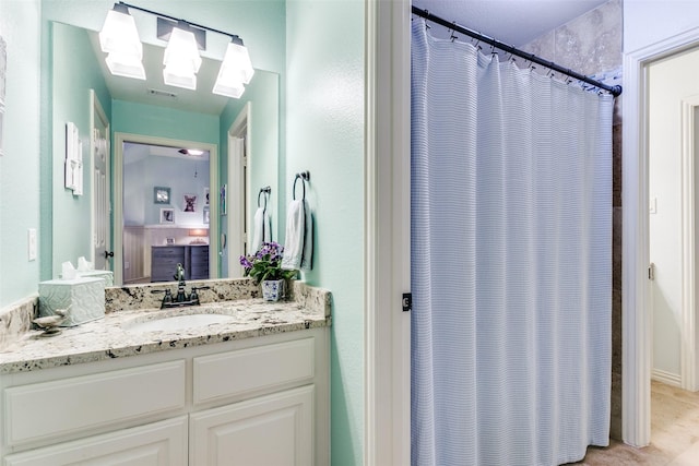 2219 Graystone Ct, Keller, TX 76248 - full bathroom featuring vanity and a shower with shower curtain
