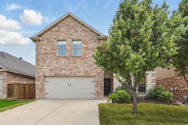 3964 Hunter Peak Rd, Fort Worth, TX 76262 - traditional-style home featuring a garage, driveway, and brick siding