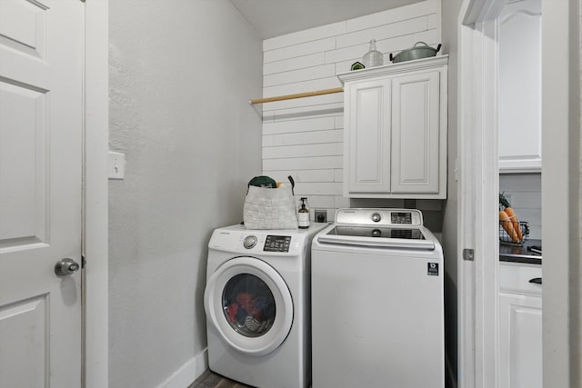 3964 Hunter Peak Rd, Fort Worth, TX 76262 - laundry area with cabinet space, washer and clothes dryer, and a textured wall