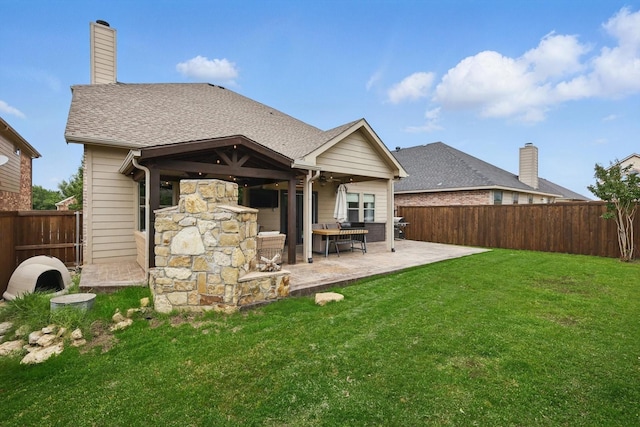 3964 Hunter Peak Rd, Fort Worth, TX 76262 - back of property with a patio, stone siding, and a chimney