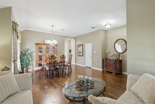 110 Lakeshore Dr, Trophy Club, TX 76262 - living area with arched walkways, wood finished floors, a chandelier, baseboards, and crown molding