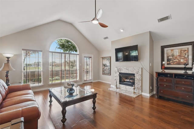 110 Lakeshore Dr, Trophy Club, TX 76262 - living area featuring ceiling fan, wood finished floors, a fireplace, baseboards, and high vaulted ceiling