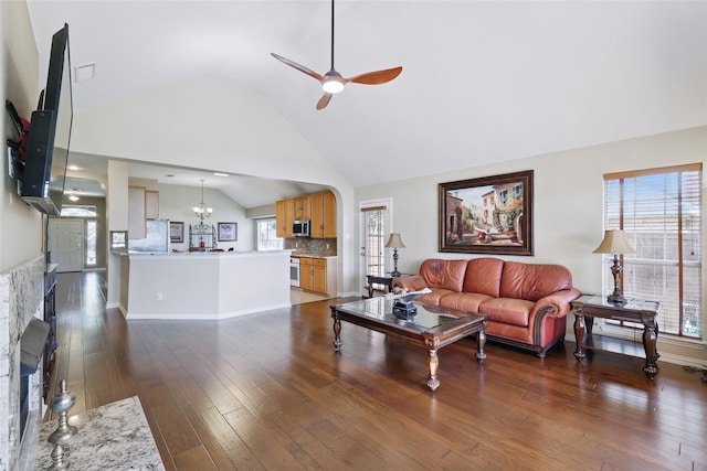 110 Lakeshore Dr, Trophy Club, TX 76262 - living room with a ceiling fan, high vaulted ceiling, dark wood-style flooring, and a chandelier