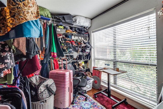 5816 Birchbrook Dr Unit 118, Dallas, TX 75206 - spacious closet featuring wood finished floors