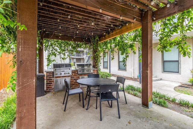 5816 Birchbrook Dr Unit 118, Dallas, TX 75206 - view of patio featuring a pergola and outdoor dining space