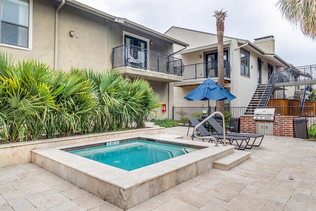 5816 Birchbrook Dr Unit 118, Dallas, TX 75206 - view of pool featuring stairs, an in-ground hot tub, and a patio area