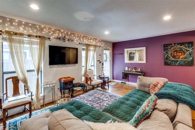 5816 Birchbrook Dr Unit 118, Dallas, TX 75206 - living area with recessed lighting, baseboards, and wood finished floors
