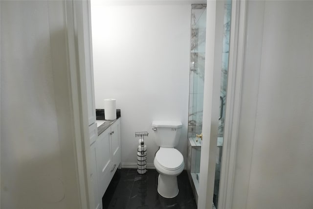 706 Midway Dr W, Euless, TX 76039 - bathroom featuring vanity, toilet, and a shower