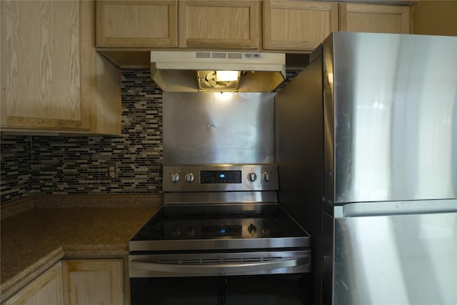 706 Midway Dr W, Euless, TX 76039 - kitchen featuring stainless steel appliances, light brown cabinets, under cabinet range hood, decorative backsplash, and dark countertops