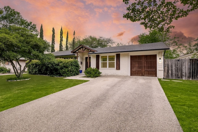 3455 Timberview Rd, Dallas, TX 75229 - ranch-style home featuring asphalt driveway, an attached garage, and brick siding