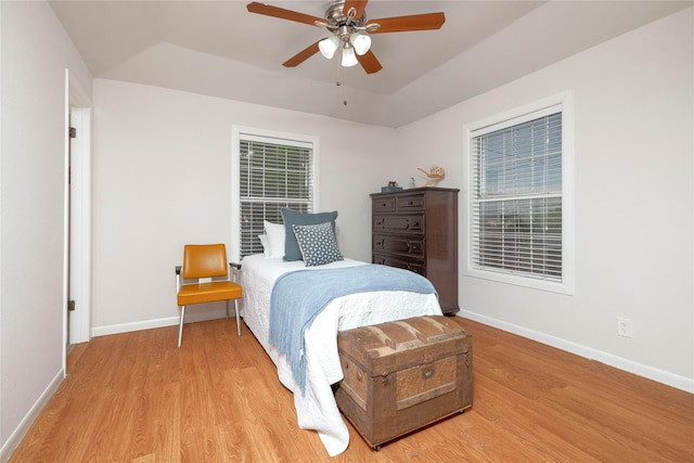 3410 Ellis Ave, Fort Worth, TX 76106 - bedroom with light wood finished floors, baseboards, ceiling fan, and multiple windows