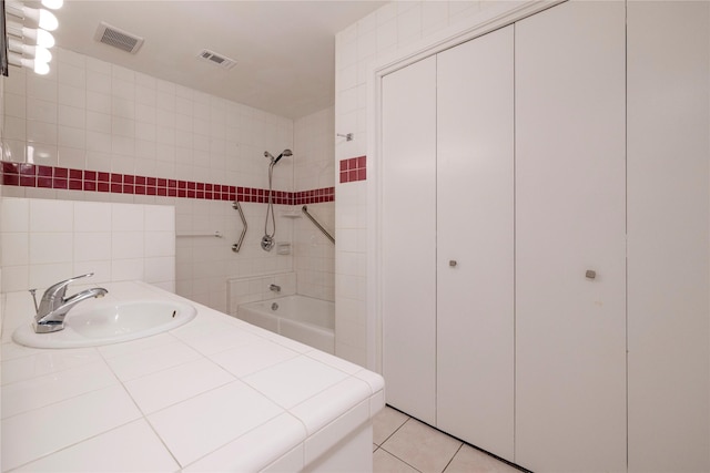 3410 Ellis Ave, Fort Worth, TX 76106 - full bathroom with a sink, shower / bathtub combination, and tile patterned flooring