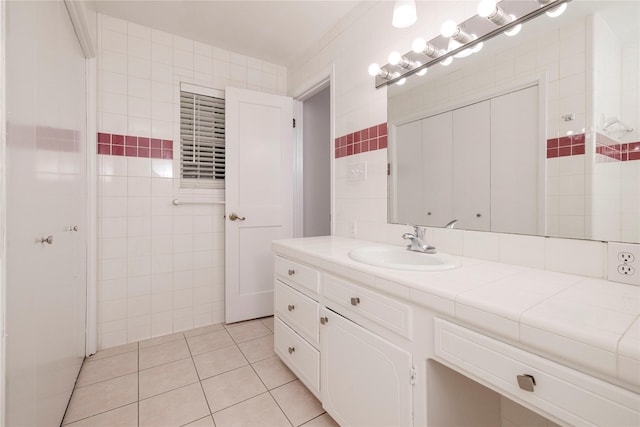 3410 Ellis Ave, Fort Worth, TX 76106 - bathroom with tile walls, vanity, and tile patterned flooring