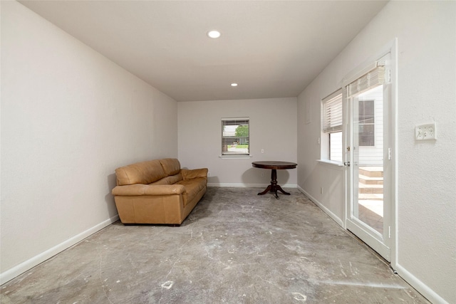 3410 Ellis Ave, Fort Worth, TX 76106 - sitting room with concrete flooring, baseboards, and recessed lighting