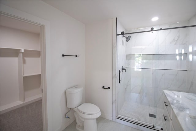 10734 Coogan Dr, Dallas, TX 75229 - full bathroom with a marble finish shower, toilet, vanity, and a spacious closet