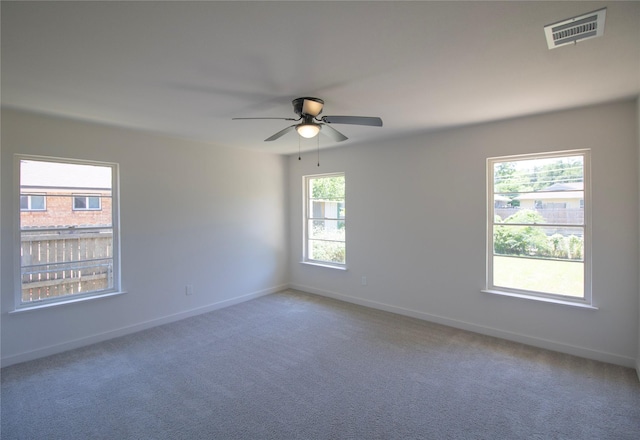 10734 Coogan Dr, Dallas, TX 75229 - unfurnished room featuring baseboards, a ceiling fan, and carpet floors