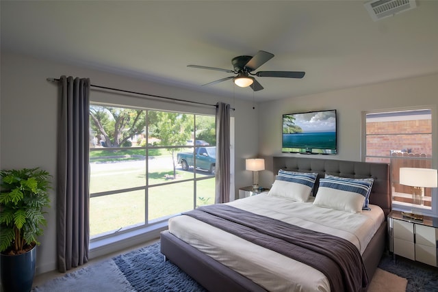10734 Coogan Dr, Dallas, TX 75229 - carpeted bedroom with a ceiling fan