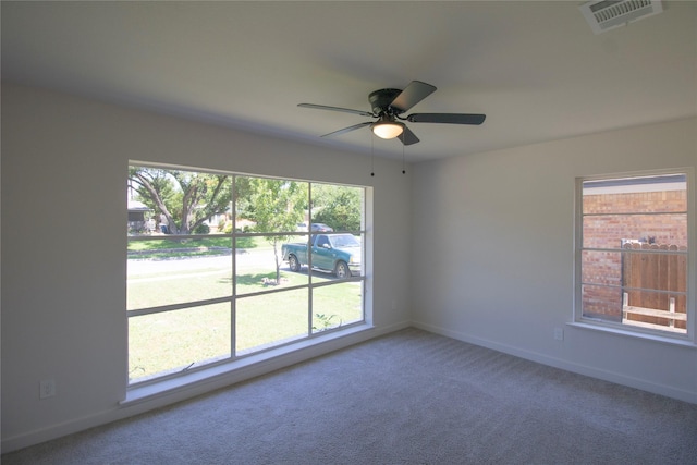 10734 Coogan Dr, Dallas, TX 75229 - carpeted spare room featuring a ceiling fan and baseboards