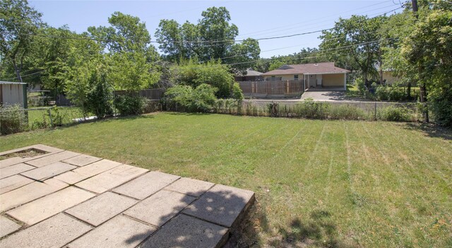 10734 Coogan Dr, Dallas, TX 75229 - view of yard featuring a patio area