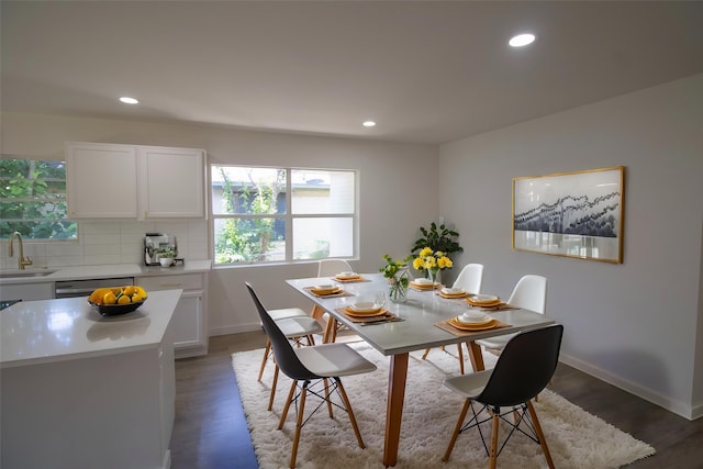 10734 Coogan Dr, Dallas, TX 75229 - dining area featuring healthy amount of natural light, recessed lighting, wood finished floors, and baseboards