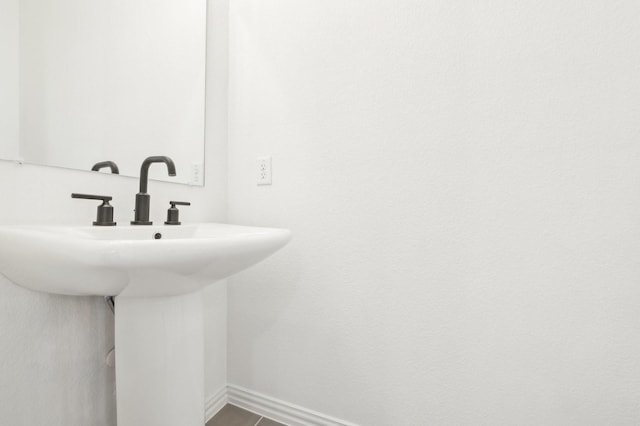 1213 Palmetto Dr, Forney, TX 75126 - bathroom with a sink and baseboards