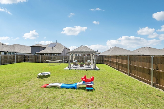 1213 Palmetto Dr, Forney, TX 75126 - view of yard with a gazebo, a patio, and a fire pit
