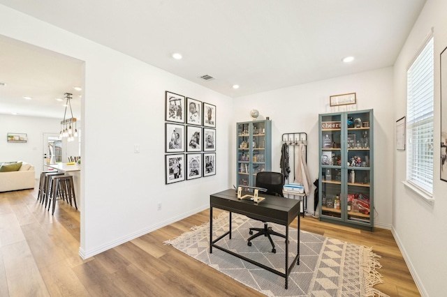 1213 Palmetto Dr, Forney, TX 75126 - office area with wood finished floors, baseboards, and recessed lighting