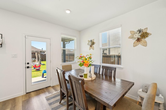 1213 Palmetto Dr, Forney, TX 75126 - dining area with light wood-style floors and baseboards