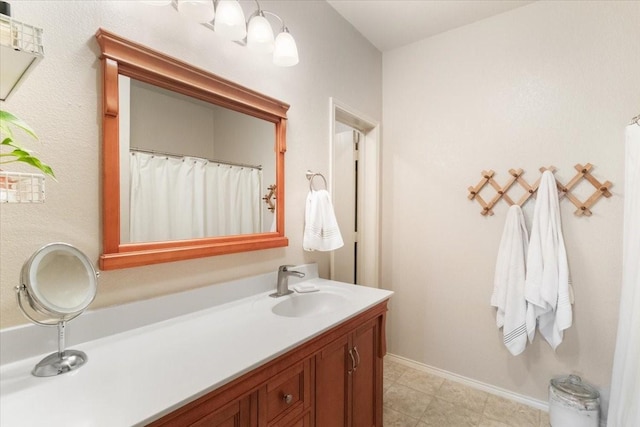 2113 Brenham Dr, Forney, TX 75126 - full bath with vanity, baseboards, and tile patterned floors