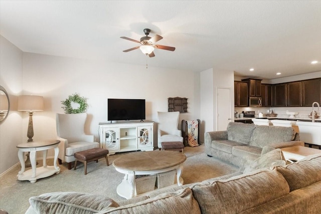 2113 Brenham Dr, Forney, TX 75126 - living room featuring a ceiling fan, light carpet, recessed lighting, and baseboards