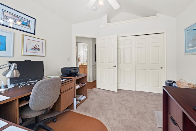 908 Bridges Dr, Arlington, TX 76012 - home office with vaulted ceiling, a ceiling fan, and light carpet