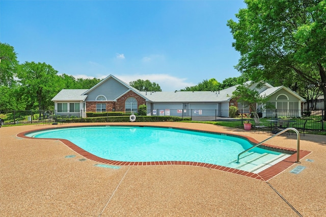 908 Bridges Dr, Arlington, TX 76012 - community pool with a patio