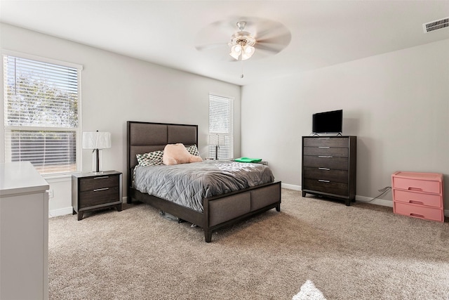 2013 Elara Dr, Haslet, TX 76052 - bedroom with light carpet, multiple windows, and baseboards