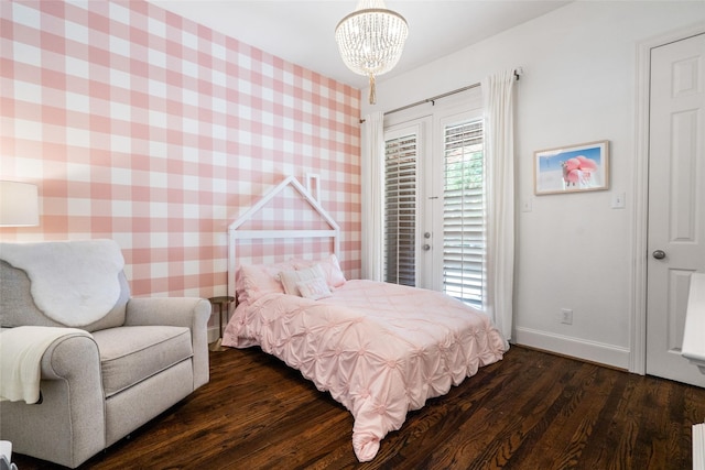 913 Bristlewood Dr, Mckinney, TX 75072 - bedroom featuring dark wood finished floors, baseboards, access to exterior, a chandelier, and wallpapered walls